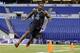 South Carolina defensive lineman Jadeveon Clowney runs a drill at the NFL football scouting combine in Indianapolis, Monday, Feb. 24, 2014. (AP Photo/Michael Conroy)