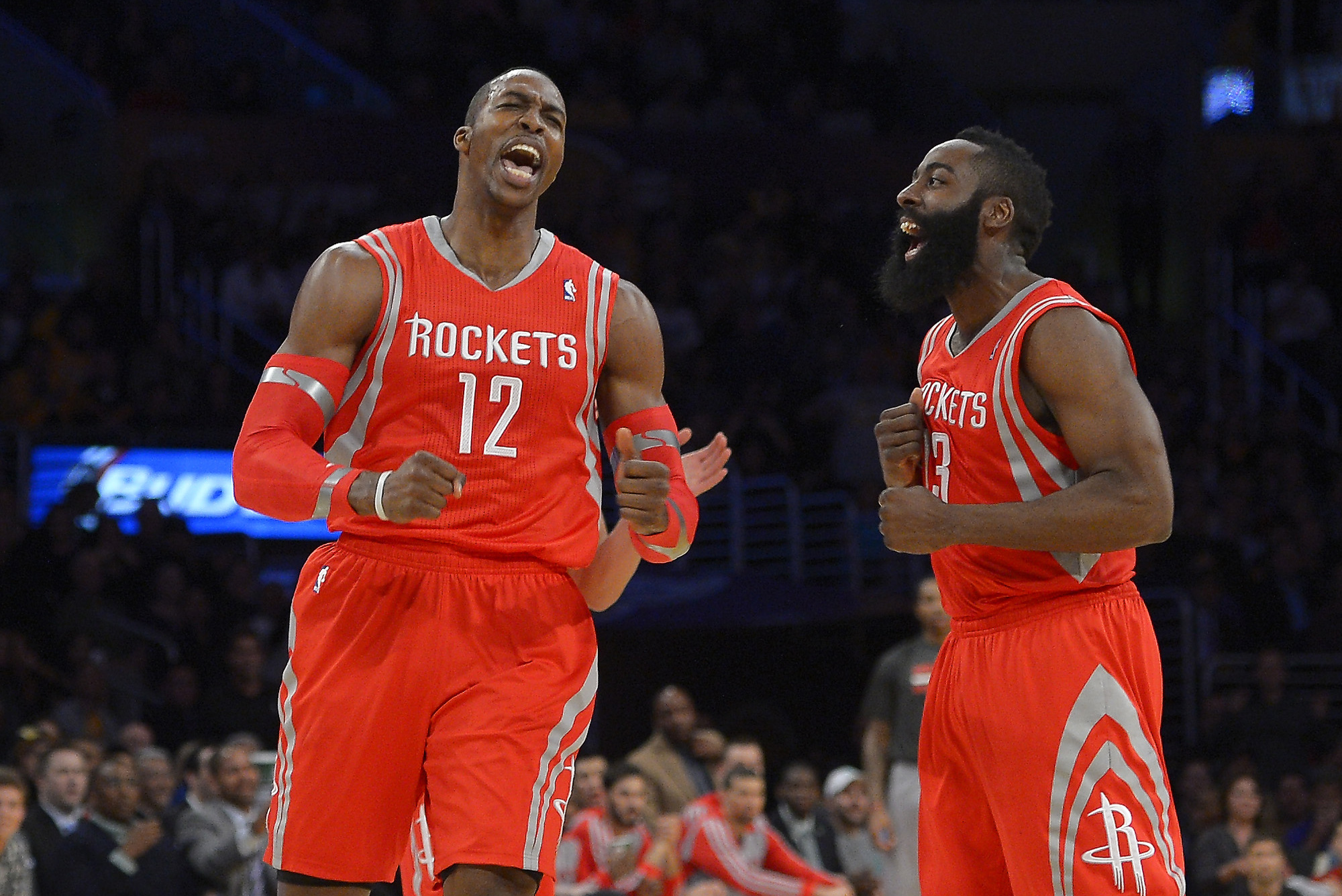Houston Rockets center Dwight Howard, left, and guard James Harden reacts after Howard was called for a technical foul during the first half of an NBA basketball game against the Los Angeles Lakers, Wednesday, Feb. 19, 2014, in Los Angeles. (AP Photo/Mark J. Terrill)
