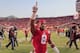 Nebraska running back Ameer Abdullah (8) gestures to fans in the stands following an NCAA college football game against Northwestern in Lincoln, Neb., Saturday, Nov. 2, 2013. Nebraska won 27-24. (AP Photo/Nati Harnik)