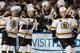 TAMPA, FL - OCTOBER 19: David Krejci #46, Jarome Iginla #12, and Milan Lucic #17 of the Boston Bruins are congratulated by teammates after a goal against the Tampa Bay Lightning during the first period at the Tampa Bay Times Forum on October 19, 2013 in Tampa, Florida. (Photo by Scott Audette/NHLI via Getty Images)