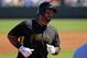 Pittsburgh Pirates' Pedro Alvarez, rounds third base after hitting a two-run home run off Red Sox pitcher Brandon Workman during the first inning of an exhibition spring training baseball game in Bradenton, Fla., Monday, March 3, 2014. The Pirates won 7-6. (AP Photo/Gene J. Puskar)
