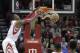 Houston Rockets center Dwight Howard dunks against the Detroit Pistons during the first half of an NBA basketball game, Saturday, March 1, 2014, in Houston. (AP Photo/Bob Levey)