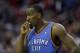 Oklahoma City Thunder's Kendrick Perkins (5) pauses after being called for a foul against the Houston Rockets during the fourth quarter of an NBA basketball game Thursday, Jan. 16, 2014, in Houston. The Thunder beat the Rockets 104-92. (AP Photo/David J. Phillip)