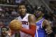 Detroit Pistons center Andre Drummond (0), guarded by New York Knicks forward Amar'e Stoudemire, passes the ball during the second half of an NBA basketball game in Auburn Hills, Mich., Monday, March 3, 2014. (AP Photo/Carlos Osorio)
