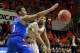 Mar 1, 2014; Stillwater, OK, USA; Oklahoma State Cowboys guard Marcus Smart (33) passes against Kansas Jayhawks guard Wayne Selden, Jr. (1) during the first half at Gallagher-Iba Arena. Oklahoma State beat Kansas 72-65. Mandatory Credit: Tim Heitman-USA TODAY Sports