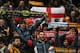 MANCHESTER, ENGLAND - FEBRUARY 18: Barcelona fans celebrate during the UEFA Champions League Round of 16 first leg match between Manchester City and Barcelona at the Etihad Stadium on February 18, 2014 in Manchester, England. (Photo by Clive Brunskill/Getty Images)