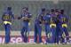Sri Lankan players celebrate their win over Afghanistan during the Asia Cup one-day international cricket match in Dhaka, Bangladesh, Monday, March 3, 2014. Sri Lanka won the match by 129 runs. (AP Photo/A.M. Ahad)