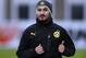 Dortmund's Ilkay Gundogan warms up during a training session one day ahead the Champions League group F soccer match between Borussia Dortmund and Arsenal FC in Dortmund, Germany, Tuesday, Nov. 5, 2013. (AP Photo/Frank Augstein)