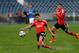 Benfica's Nico Gaitan, from Argentina, shoots to score the opening goal during their Portuguese league soccer match with Belenenses Sunday, March 2 2014, at Belenenses' Restelo stadium in Lisbon. (AP Photo/Armando Franca)