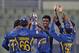 Sri Lanka’s Thisara Perera, center, celebrates with teammates after taking the wicket of Afghanistan’s Nawroz Mangal during the Asia Cup one-day international cricket tournament between them in Dhaka, Bangladesh, Monday, March 3, 2014. (AP Photo/A.M. Ahad)