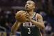 Milwaukee Bucks' Caron Butler (3) shoots a free throw against the Orlando Magic during the first half of an NBA basketball game in Orlando, Fla., Friday, Jan. 31, 2014.(AP Photo/John Raoux)