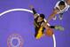 Los Angeles Lakers guard Kent Bazemore, left, goes up for a dunk as Sacramento Kings forward Rudy Gay defends during the first half of an NBA basketball game, Friday, Feb. 28, 2014, in Los Angeles. (AP Photo/Mark J. Terrill)