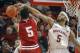 Nebraska guard/forward Terran Petteway (5) gets a block against Indiana forward Troy Williams (5) during an NCAA college basketball game, Thursday, Jan. 30, 2014 in Lincoln, Neb.(AP Photo/Dave Weaver)