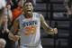 Oklahoma State guard Marcus Smart (33) celebrates during the second half of an NCAA college basketball game against Kansas in Stillwater, Okla., Saturday, March 1, 2014. Oklahoma State won 72-65. (AP Photo/Sue Ogrocki)