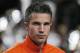 Netherlands' Robin van Persie listens to the national anthem during the Group D World Cup qualifying soccer match between Netherlands and Hungary, at ArenA stadium in Amsterdam, Netherlands, Friday Oct. 11, 2013. (AP Photo/Peter Dejong)