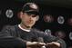 Like Jim Harbaugh's hand motion indicates, can the 49ers quell this ongoing situation with a contract extension?