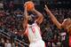 HOUSTON, TX - MARCH 4: James Harden #13 of the Houston Rockets shoots against the Miami Heat at the Toyota Center March 4, 2014 in Houston, Texas. NOTE TO USER: User expressly acknowledges and agrees that, by downloading and or using this photograph, User is consenting to the terms and conditions of the Getty Images License Agreement. Mandatory Copyright Notice: Copyright 2014 NBAE (Photo by Jesse D. Garrabrant/NBAE via Getty Images)