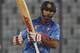 India’s Shikhar Dhawan watches his shot during the match against Afghanistan of the Asia Cup one-day international cricket tournament in Dhaka, Bangladesh, Wednesday, March 5, 2014. (AP Photo/A.M. Ahad)