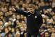 Cardiff City's manager Ole Gunnar Solskjaer gestures to his players as he watches his team play against Tottenham Hotspur during their English Premier League soccer match at White Hart Lane, London, Sunday, March 2, 2014. (AP Photo/Sang Tan)