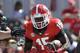 Georgia running back J.J. Green (15) runs against Missouri in the second half of an NCAA college football game Saturday, Oct. 12, 2013 in Athens, Ga., Missouri won 41-26. (AP Photo/John Bazemore)