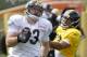 The Steelers restructured the contracts of tight end Heath Miller and safety Troy Polamalu on Wednesday, freeing up $7.9 million in cap space.