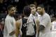 San Antonio Spurs' Tim Duncan, right, visits with Cleveland Cavaliers' Tristan Thompson, left, and Spencer Hawes after an NBA basketball game Tuesday, March 4, 2014, in Cleveland. (AP Photo/Mark Duncan)