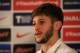 WATFORD, ENGLAND - MARCH 03: Adam Lallana talks to the media during a press conference at The Grove hotel on March 3, 2014 in Watford, England. (Photo by Richard Heathcote/Getty Images)
