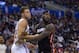 Los Angeles Clippers forward Blake Griffin, left, and Miami Heat forward LeBron James vie for a rebound during the first half of an NBA basketball game, Wednesday, Feb. 5, 2014, in Los Angeles. (AP Photo/Mark J. Terrill)