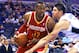 Mar 5, 2014; Orlando, FL, USA; Houston Rockets shooting guard James Harden (13) drives to the basket against Orlando Magic shooting guard Arron Afflalo (4) during the second half at Amway Center. Houston Rockets defeated the Orlando Magic 101-89. Mandatory Credit: Kim Klement-USA TODAY Sports