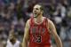 Chicago Bulls center Joakim Noah (13) reacts after a play during the second half of an NBA basketball game against the Detroit Pistons in Auburn Hills, Mich., Wednesday, March 5, 2014. Noah had a triple-double as the Bulls defeated the Pistons 105-94. (AP Photo/Carlos Osorio)