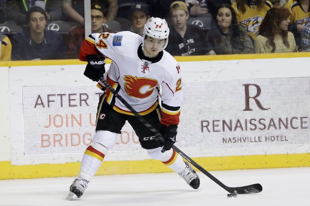 Wideman, Hudler Leave Game with Upper-Body Injuries