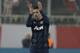 Manchester United's Robin van Persie applauds the fans of his team after a Champions League, round of 16, first leg soccer match against Olympiakos at Georgios Karaiskakis stadium, in Piraeus port, near Athens, on Tuesday, Feb. 25, 2014. Olympiakos won 2-0. (AP Photo/Thanassis Stavrakis)