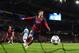 MANCHESTER, ENGLAND - FEBRUARY 18: Lionel Messi of Barcelona celebrates scoring the opening goal from a penalty kick during the UEFA Champions League Round of 16 first leg match between Manchester City and Barcelona at the Etihad Stadium on February 18, 2014 in Manchester, England. (Photo by Clive Brunskill/Getty Images)