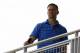 Chicago Cubs President of Baseball Operations, Theo Epstein watches from the tower during spring training baseball practice, Wednesday, Feb. 19, 2014, in Mesa, Ariz. (AP Photo/Rick Scuteri)
