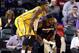 Dec 10, 2013; Indianapolis, IN, USA; Indiana Pacers forward Paul George (24) is guarded by Miami Heat forward LeBron James (6) at Bankers Life Fieldhouse. Mandatory Credit: Brian Spurlock-USA TODAY Sports