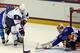 LAKE PLACID, NY - AUGUST 08: Joonas Korpisalo #32 of Team Finland gets in position to make a save on Hudson Fasching #8 of Team USA during the 2013 USA Hockey Junior Evaluation Camp at the Lake Placid Olympic Center on August 8, 2013 in Lake Placid, New York. (Photo by Bruce Bennett/Getty Images)