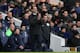Everton's manager Roberto Martinez claps as he watches his side during the English Premier League soccer match between Tottenham Hotspur and Everton at the White Hart Lane stadium in London, Sunday, Feb. 9 2014. (AP Photo/Alastair Grant)