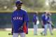 Texas Rangers manager Ron Washington watches position players during spring training baseball practice, Tuesday, Feb. 18, 2014, in Surprise, Ariz. (AP Photo/Tony Gutierrez)