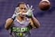 Texas Christian defensive back Jason Verrett makes a catch as he runs a drill at the NFL football scouting combine in Indianapolis, Tuesday, Feb. 25, 2014. (AP Photo/Michael Conroy)