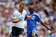 LONDON, ENGLAND - SEPTEMBER 28: Roberto Soldado of Tottenham Hotspur holds off Ramires of Chelsea during the Barclays Premier League match between Tottenham Hotspur and Chelsea at White Hart Lane on September 28, 2013 in London, England. (Photo by Clive Rose/Getty Images)