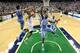 GREENSBORO, NC - MARCH 17: Trey McKinney Jones #4 of the Miami Hurricanes drives to the basket between teammates James Michael McAdoo #43 and Reggie Bullock #35 of the North Carolina Tar Heels during the finals of the Men's ACC Basketball Tournament at Greensboro Coliseum on March 17, 2013 in Greensboro, North Carolina. (Photo by Streeter Lecka/Getty Images)