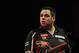 LONDON, ENGLAND - DECEMBER 18: Adrian Lewis of England during his first round match against Dennis Smith of England during the Ladbrokes.com World Darts Championship on Day Six at Alexandra Palace on December 18, 2013 in London, England. (Photo by Charlie Crowhurst/Getty Images)