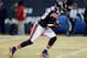 CHICAGO, IL - DECEMBER 29: Wide receiver Devin Hester #23 of the Chicago Bears runs with the ball against the Green Bay Packers during a game at Soldier Field on December 29, 2013 in Chicago, Illinois. (Photo by Jonathan Daniel/Getty Images)