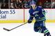 VANCOUVER, BC - FEBRUARY 26: Raphael Diaz #24 of the Vancouver Canucks skates up ice during their NHL game against the St. Louis Blues at Rogers Arena February 26, 2014 in Vancouver, British Columbia, Canada. Vancouver won 1-0. (Photo by Jeff Vinnick/NHLI via Getty Images)