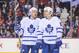 CALGARY, AB - OCTOBER 30: David Clarkson #71 and Dave Bolland #63 of the Toronto Maple Leafs confer between play against the Calgary Flames during an NHL game at Scotiabank Saddledome on October 30, 2013 in Calgary, Alberta, Canada. (Photo by Derek Leung/Getty Images)
