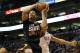 Phoenix Suns' Gerald Green (14) drives past Oklahoma City Thunder forward Andre Roberson during the second half of an NBA basketball game on Thursday, March 6, 2014, in Phoenix. The Suns won 128-122. (AP Photo/Matt York)