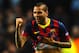 MANCHESTER, ENGLAND - FEBRUARY 18: Daniel Alves of Barcelona celebrates scoring his team's second goal during the UEFA Champions League Round of 16 first leg match between Manchester City and Barcelona at the Etihad Stadium on February 18, 2014 in Manchester, England. (Photo by Laurence Griffiths/Getty Images)