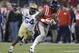 Mississippi wide receiver Laquon Treadwell, right, makes a catch in front of Georgia Tech linebacker Quayshawn Nealy (54) for a 27-yard gain in the fourth quarter of the NCAA college football Music City Bowl on Monday, Dec. 30, 2013, in Nashville, Tenn. Mississippi won 25-17. (AP Photo/Mark Humphrey)