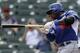 SCOTTSDALE, AZ - FEBRUARY 26: Yasiel Puig #66 of the Los Angeles Dodgers hits a broken bat single in the top of the first inning against the Arizona Diamondbacks at Salt River Fields at Talking Stick on February 26, 2014 in Scottsdale, Arizona. (Photo by Mike McGinnis/Getty Images)