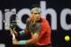 RIO DE JANEIRO, BRAZIL - FEBRUARY 23: Rafael Nadal of Spain returns the ball to Alexandr Dolgopolov of Ukraine during the ATP Rio Open 2014 at Jockey Club Rio de Janeiro on February 23, 2014 in Rio de Janeiro, Brazil. (Photo by Buda Mendes/Getty Images)